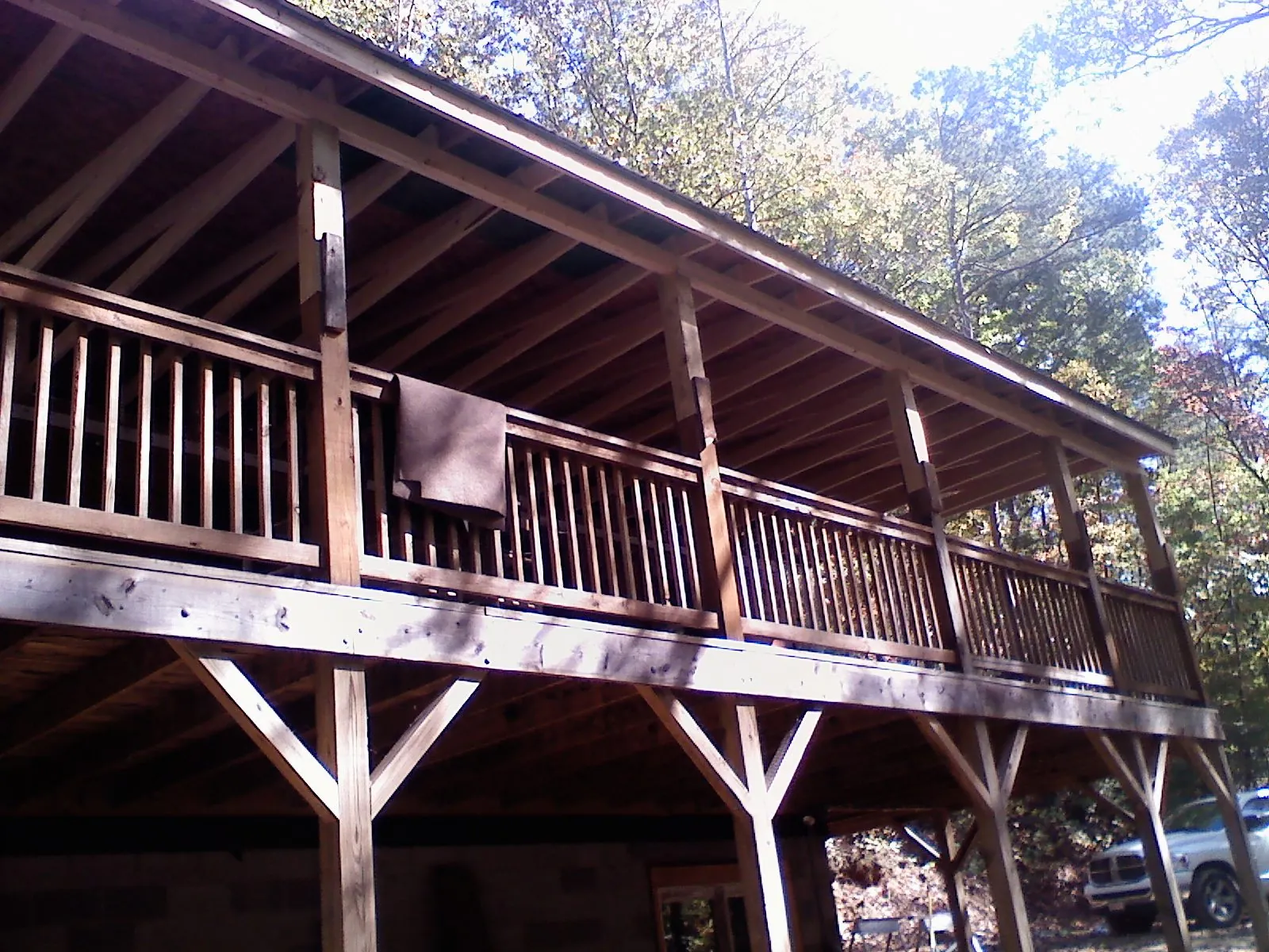 Timber framing under a new elevated porch and deck — Roof Leak Repair in Navarre by Roofing Brothers